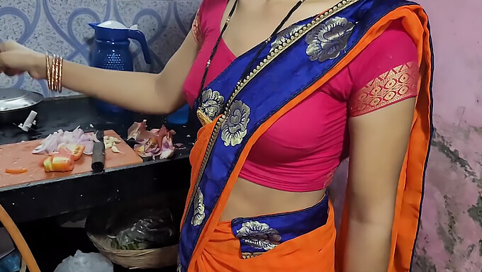 A Young Indian Housewife Cooks In The Kitchen While Her Lover Takes Advantage Of Her From Behind