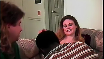 A Promiscuous Teen Gives Oral Pleasure To A Man While A Black Man Vigorously Penetrates Her From Behind