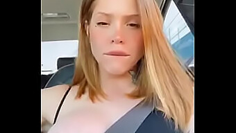 Redhead Teen Flaunts Big Boobs And Ass While Behind The Wheel