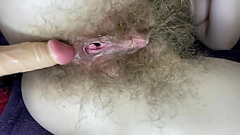 Close-Up Of Hairy Babe Pleasuring Herself With A Sex Toy