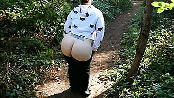 Mature Woman Flaunts Her Ass And Masturbates In Outdoor Setting